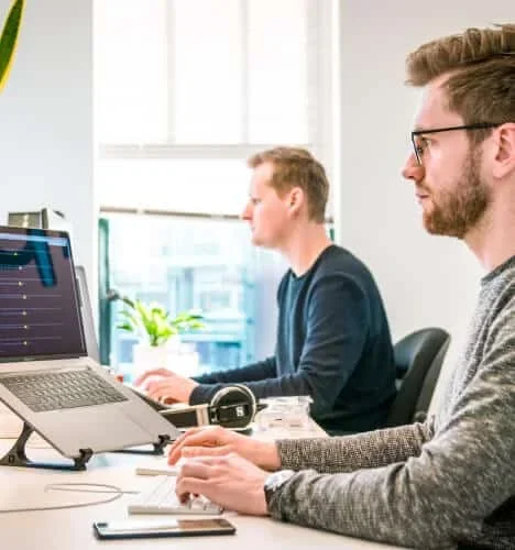 People working with technology